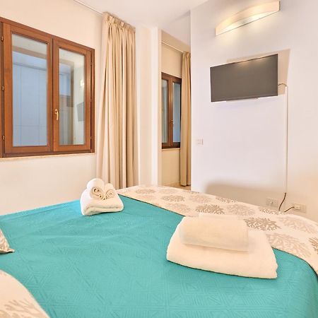 Oidu - Cagliari Suites Экстерьер фото